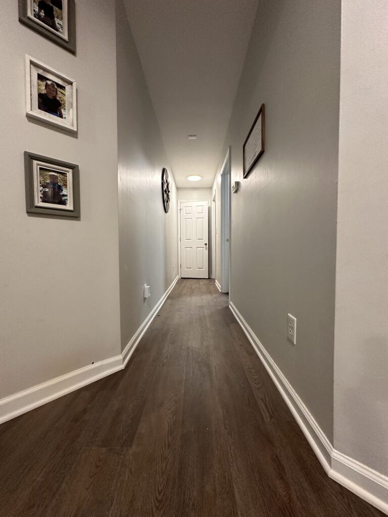 Hardwood flooring installation in Charlotte NC living room with engineered wood planks